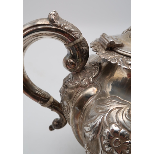 2430 - AN EARLY VICTORIAN SCOTTISH SILVER TEAPOTby Milne & Campbell, Edinburgh 1841, of lobed form, wit... 