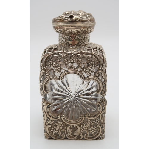 2431 - A COLLECTION OF SILVERincluding a late Victorian overlaid silver cut glass perfume flask, by William... 