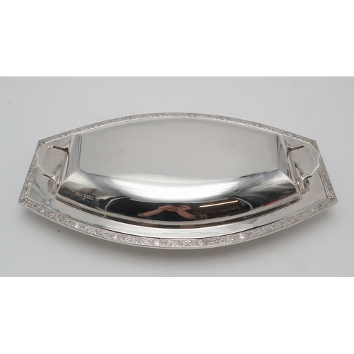 2433 - A GEORGE VI SILVER TUREEN AND COVERby S.G. Jacobs, Sheffield 1937, of shaped oval form, with celtic ... 