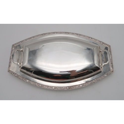 2433 - A GEORGE VI SILVER TUREEN AND COVERby S.G. Jacobs, Sheffield 1937, of shaped oval form, with celtic ... 