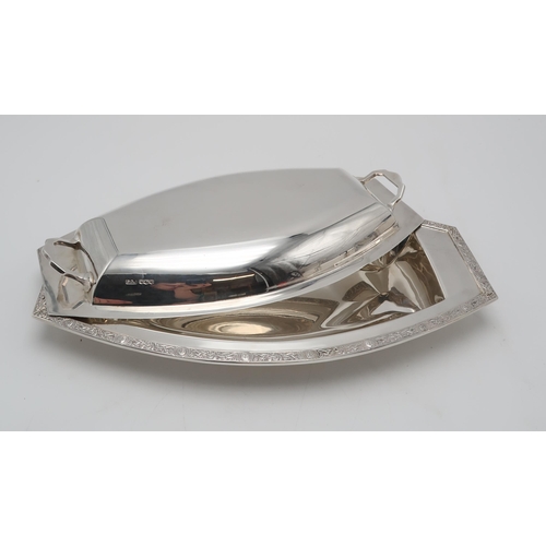 2433 - A GEORGE VI SILVER TUREEN AND COVERby S.G. Jacobs, Sheffield 1937, of shaped oval form, with celtic ... 