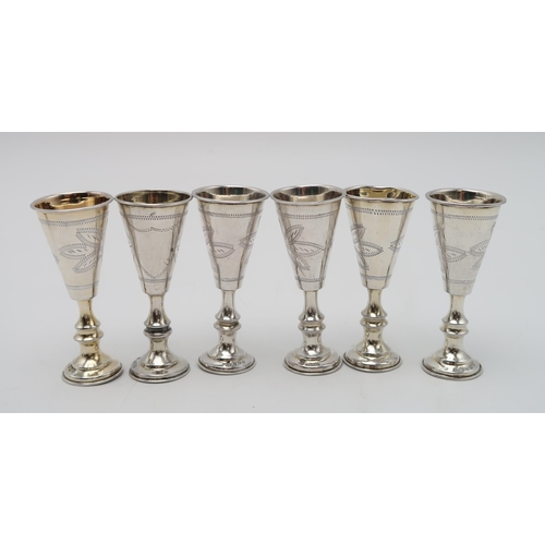 2437 - A COLLECTION OF SILVER KIDDUSH CUPSincluding a pair by Moses Salkind & Co, London 1901, another ... 