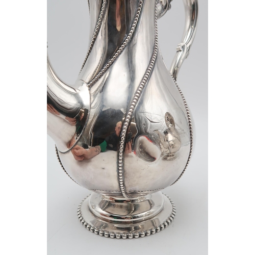 2439 - A MATCHED FOUR PIECE SILVER TEA SERVICEthe hot water pot and cream jug by Robert Hennell II, London ... 