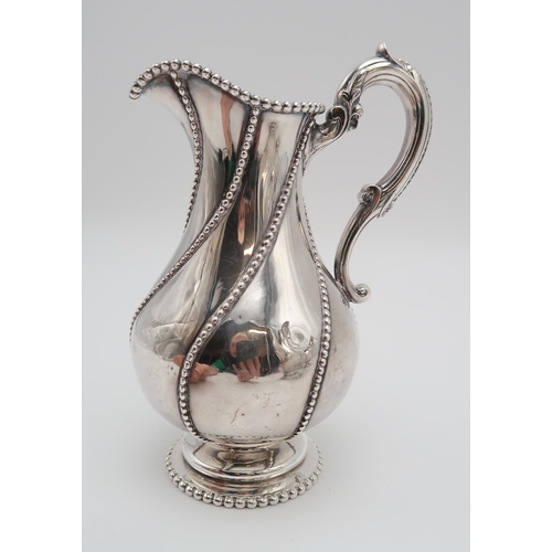 2439 - A MATCHED FOUR PIECE SILVER TEA SERVICEthe hot water pot and cream jug by Robert Hennell II, London ... 