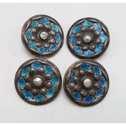 2443 - LIBERTY& CO;A set of five Cymric silver & enamel buttons, Birmingham 1901, decorated turquoi... 