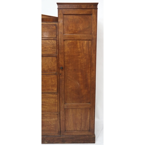 2003 - A VICTORIAN MAHOGANY COMPACTUM WARDROBEwith two short over two long over two short over two long dra... 