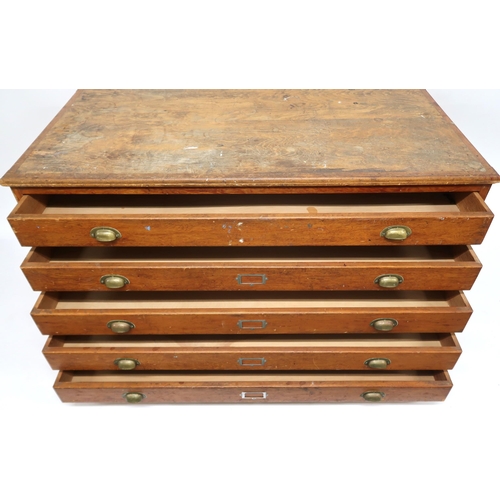2012 - A 20TH CENTURY PITCH PINE PLAN CHEST with five drawers on plinth base, 87cm high x 150cm wide x 77cm... 