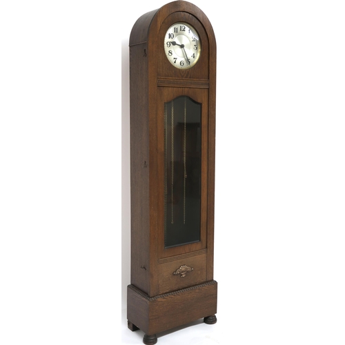 2031 - AN EARLY 20TH CENTURY OAK CASED DOME TOPPED LONGCASE CLOCK with silvered dial bearing Arabic numeral... 