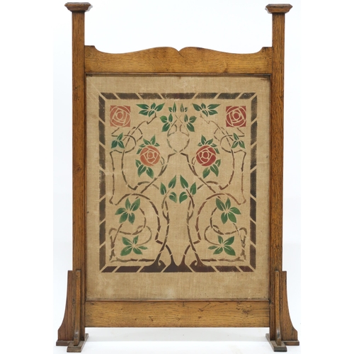 2045 - A LATE VICTORIAN OAK FRAMED GLASGOW STYLE FIRE SCREEN with central panel decorated with floral and f... 