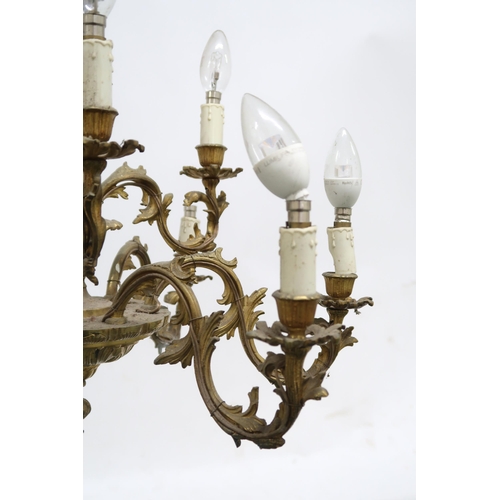2051 - A CONTINENTAL ROCOCO STYLE GILT METAL CHANDELIER AND A PAIR OF WALL SCONCES chandelier with nine scr... 