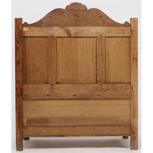 2053 - AN EARLY 20TH CENTURY CARVED OAK HALL SETTLE with lion masque surmount other carved foliate pan... 