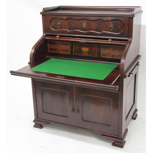 2054 - A VICTORIAN MAHOGANY ROLL TOP DESK with shaped galleried top over single fitted secretaire draw... 