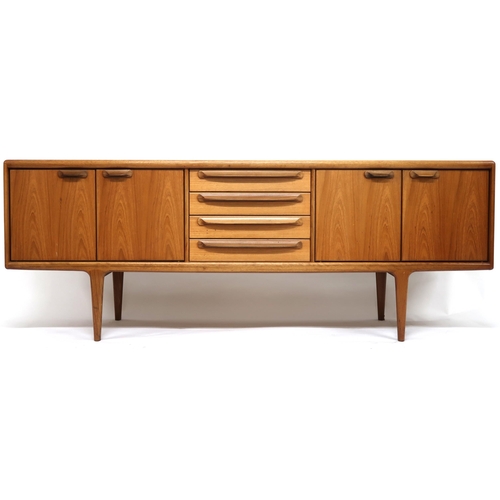 2101 - A MID 20TH CENTURY TEAK JOHN HERBERT FOR YOUNGER SIDEBOARD with four central drawer flanked by pairs... 