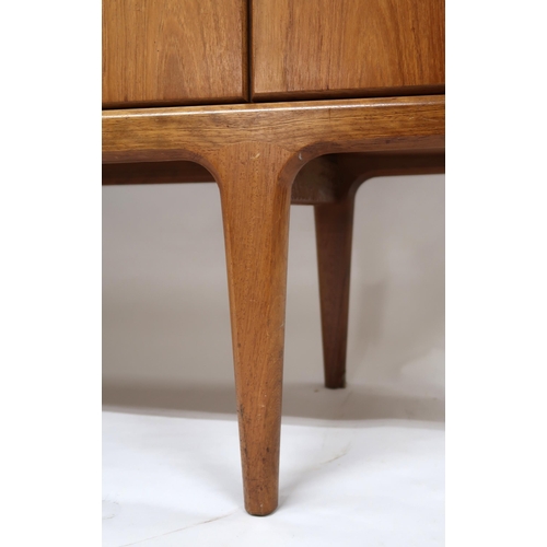 2101 - A MID 20TH CENTURY TEAK JOHN HERBERT FOR YOUNGER SIDEBOARD with four central drawer flanked by pairs... 