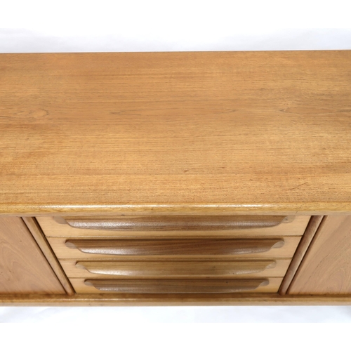 2101 - A MID 20TH CENTURY TEAK JOHN HERBERT FOR YOUNGER SIDEBOARD with four central drawer flanked by pairs... 