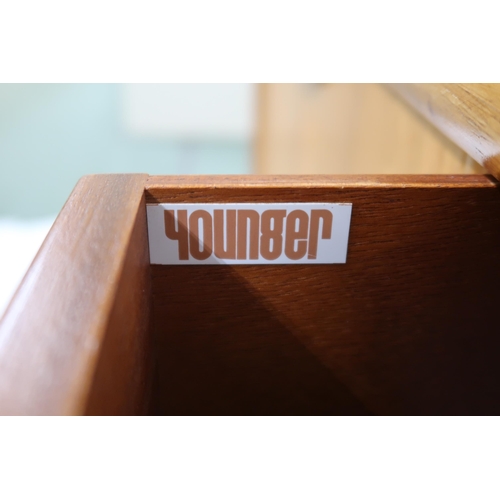 2101 - A MID 20TH CENTURY TEAK JOHN HERBERT FOR YOUNGER SIDEBOARD with four central drawer flanked by pairs... 