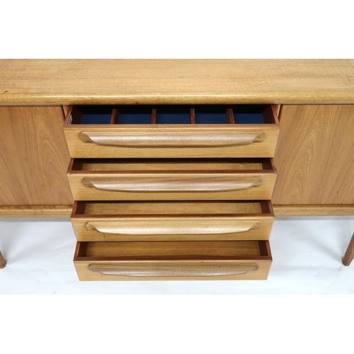 2101 - A MID 20TH CENTURY TEAK JOHN HERBERT FOR YOUNGER SIDEBOARD with four central drawer flanked by pairs... 