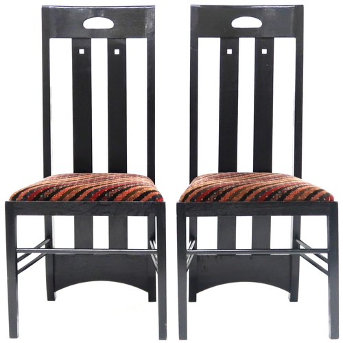 2114 - A PAIR OF 20TH CENTURY AFTER CHARLES RENNIE MACKINTOSH EBONISED CHAIRS with pierced slatted backs ov... 