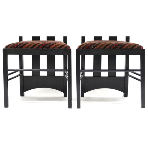 2114 - A PAIR OF 20TH CENTURY AFTER CHARLES RENNIE MACKINTOSH EBONISED CHAIRS with pierced slatted backs ov... 