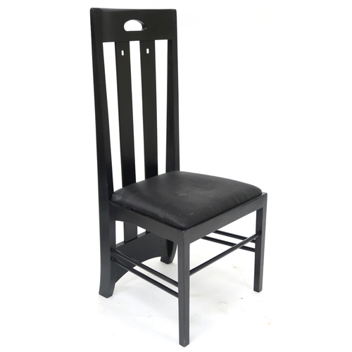 2115 - A LOT OF TWO 20TH CENTURY AFTER CHARLES RENNIE MACKINTOSH EBONISED CHAIRS the first with pierced ova... 