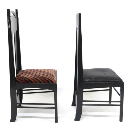 2115 - A LOT OF TWO 20TH CENTURY AFTER CHARLES RENNIE MACKINTOSH EBONISED CHAIRS the first with pierced ova... 