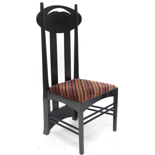 2115 - A LOT OF TWO 20TH CENTURY AFTER CHARLES RENNIE MACKINTOSH EBONISED CHAIRS the first with pierced ova... 