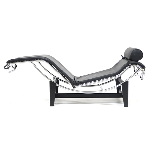 2116 - A 20TH CENTURY AFTER LE CORBUSIER TYPE LC4 CHAISE LONGUE with black vinyl head cushion and upholster... 