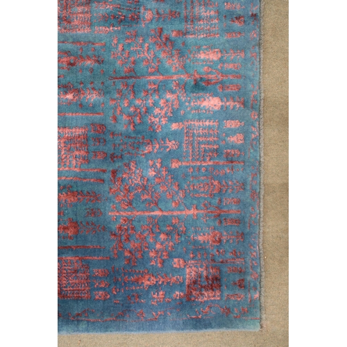 2131 - A BLUE GROUND SHIRAZ RUG with all-over mottled pink foliate patterned ground, 229cm long x 167cm wid... 