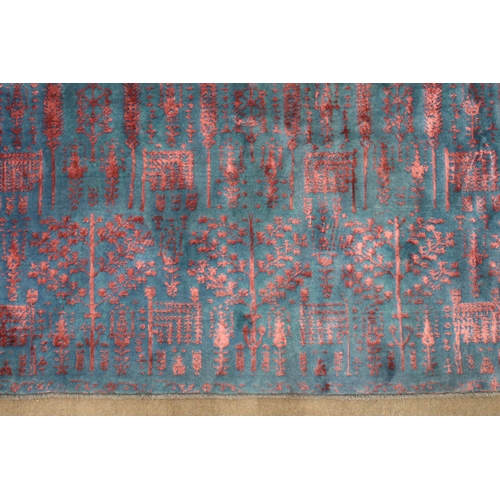 2131 - A BLUE GROUND SHIRAZ RUG with all-over mottled pink foliate patterned ground, 229cm long x 167cm wid... 