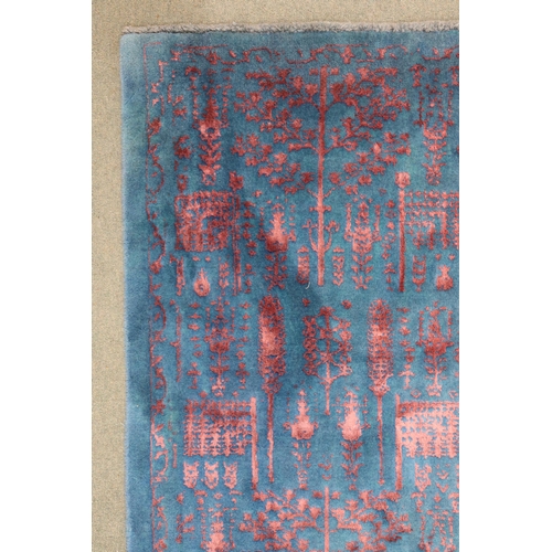 2131 - A BLUE GROUND SHIRAZ RUG with all-over mottled pink foliate patterned ground, 229cm long x 167cm wid... 