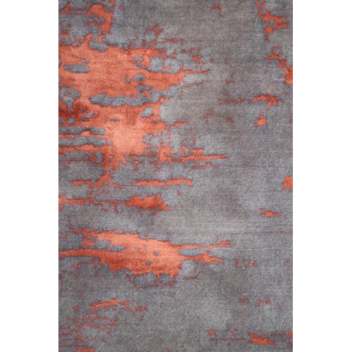 2135 - A PINK AND MAUVE GROUND SHIRAZ RUG with mottled patterned ground, 193cm long x 152cm wide... 