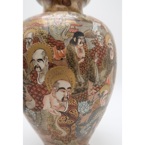 2302 - A PAIR OF SATSUMA BALUSTER VASES Painted with Kannon and immortal figures amongst a dragon and withi... 