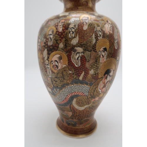 2302 - A PAIR OF SATSUMA BALUSTER VASES Painted with Kannon and immortal figures amongst a dragon and withi... 