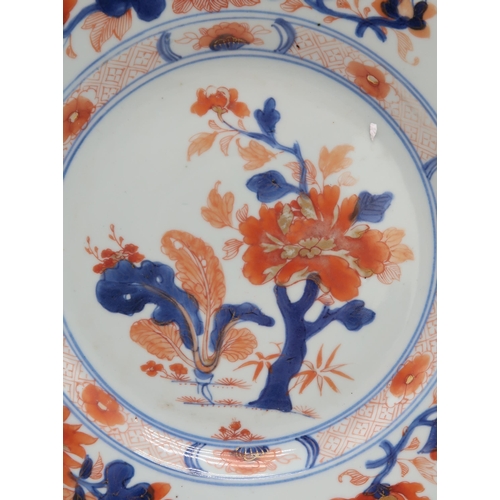 2303 - EIGHT CHINESE EXPORT PLATES AND A BOWLComprising;A shallow blue and white bowl, 24.5cm diameter,six ... 