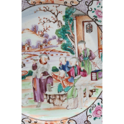 2304 - A CHINESE FAMILLE ROSE EXPORT OCTAGONAL PLATE Painted with three figures within elaborate foliate bo... 