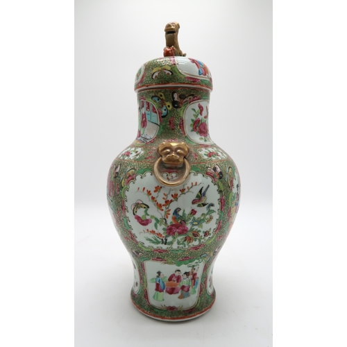 2306 - A CANTONESE BALUSTER VASE AND COVERPainted with panels of figures, birds, flowers and insects,divide... 