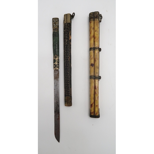 2307 - FOUR CHINESE TROUSSE EATING SETSOf traditional type in bone,bamboo,metal and hardstone, 30cm long an... 