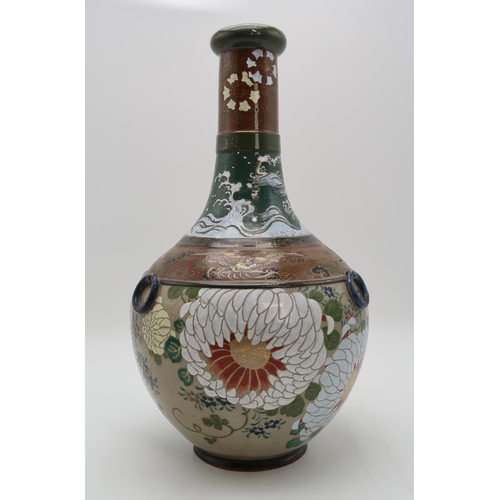 2312 - A JAPANESE BALUSTER VASE painted with chrysanthemum, Ho-o birds, crashing waves and clouds, with fix... 