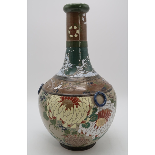 2312 - A JAPANESE BALUSTER VASE painted with chrysanthemum, Ho-o birds, crashing waves and clouds, with fix... 