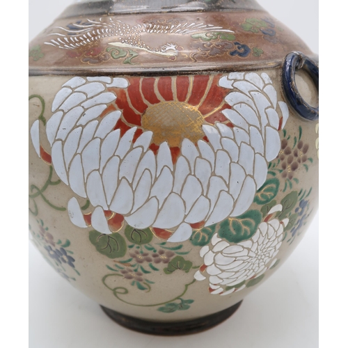 2312 - A JAPANESE BALUSTER VASE painted with chrysanthemum, Ho-o birds, crashing waves and clouds, with fix... 