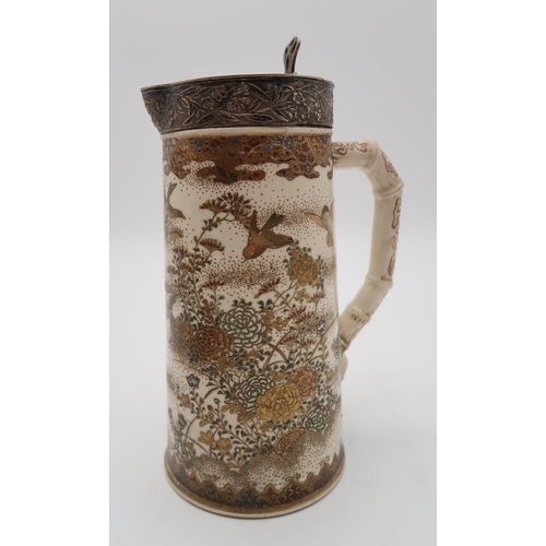 2315 - A SATSUMA WATER JUG AND PLATED COVERthe hinged cover by Elkington and Co, above birds flying amongst... 