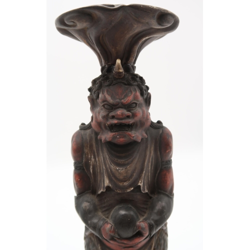 2316 - A PAIR OF CARVED WOOD,POLYCHROME AND GESSO ONI CANDLESTICKS each demon standing and facing forwards,... 