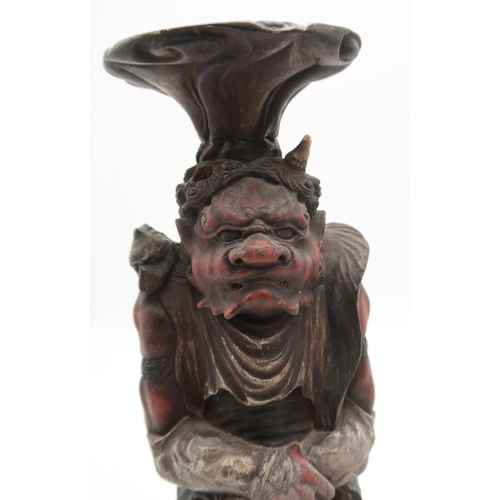 2316 - A PAIR OF CARVED WOOD,POLYCHROME AND GESSO ONI CANDLESTICKS each demon standing and facing forwards,... 