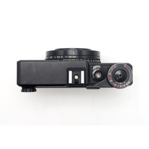 2603 - A PLAUBEL MAKINA 670 MEDIUM FORMAT CAMERAFitted with a Nikkor 1:2.8/80 lens, no. 522843, retaining i... 