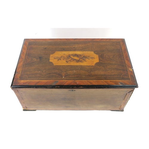 2627 - A 19th CENTURY CONTINENTAL CYLINDER MUSIC BOXThe hinged lid crossbanded in rosewood and with floral ... 