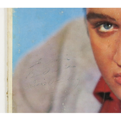 2630 - ELVIS PRESLEY: A SIGNED AND INSCRIBED COPY OF THE SOUNDTRACK ALBUM LOVING YOUThe inscription faded b... 