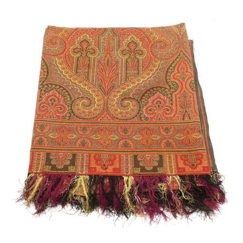 2631 - A VICTORIAN PAISLEY SHAWLWoven in hues of red and gold, measuring approx. 172cm x 165cm... 