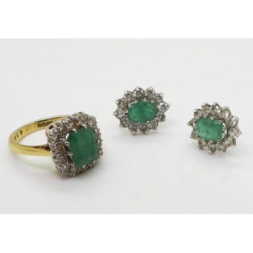 2706 - EMERALD & DIAMOND RING & EARRINGS.the 18ct gold ring, is set with estimated approx 0.35cts o... 