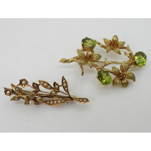 2723 - TWO VINTAGE BROOCHESa 9ct gold lily flower and peridot brooch, hallmarked London 1973, made by Cropp... 