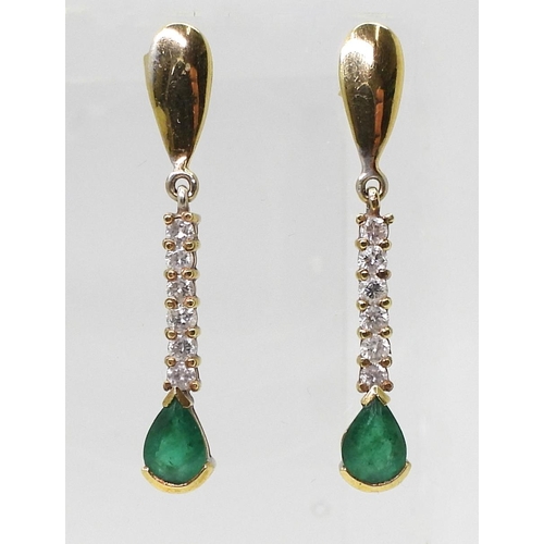 2729 - EMERALD & DIAMOND EARRINGSmounted in 18k gold, with two pear shaped emeralds of approx 7mm x 5mm... 